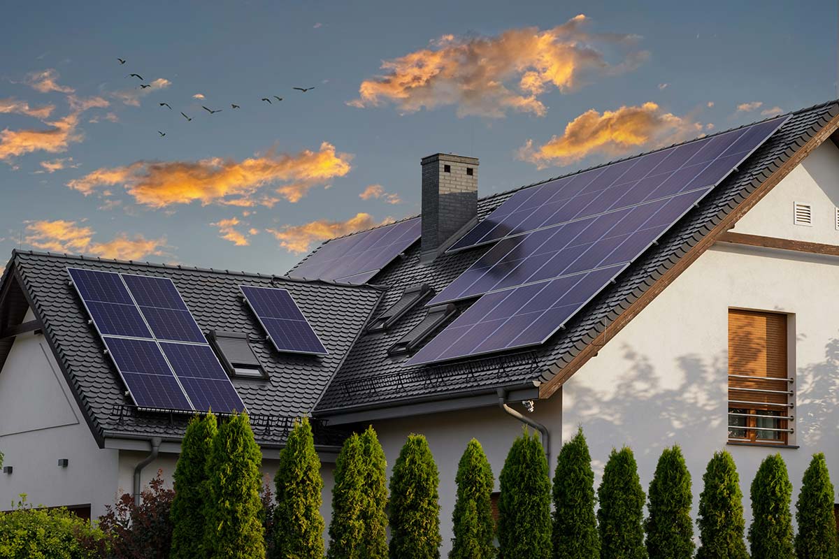 Home with rooftop solar panels illustrating savings before the Federal Solar Tax Credit ends in 2025