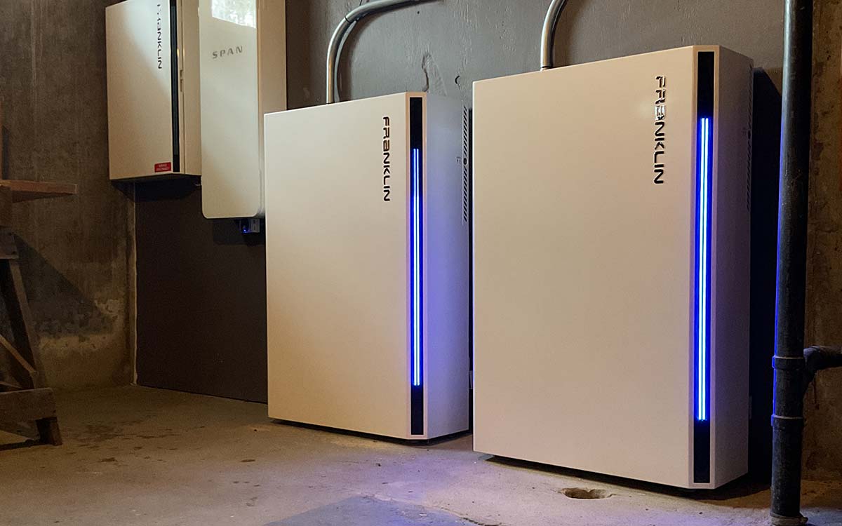 Two Franklin home battery storage units installed in a basement, part of a solar + storage system supporting rural homes in Western Massachusetts.