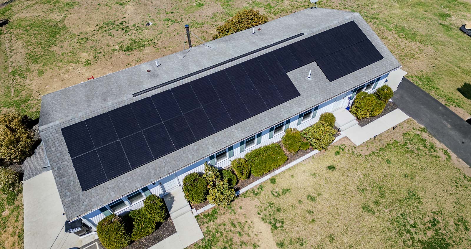 Roof-mounted solar panels on a house in Western Massachusetts