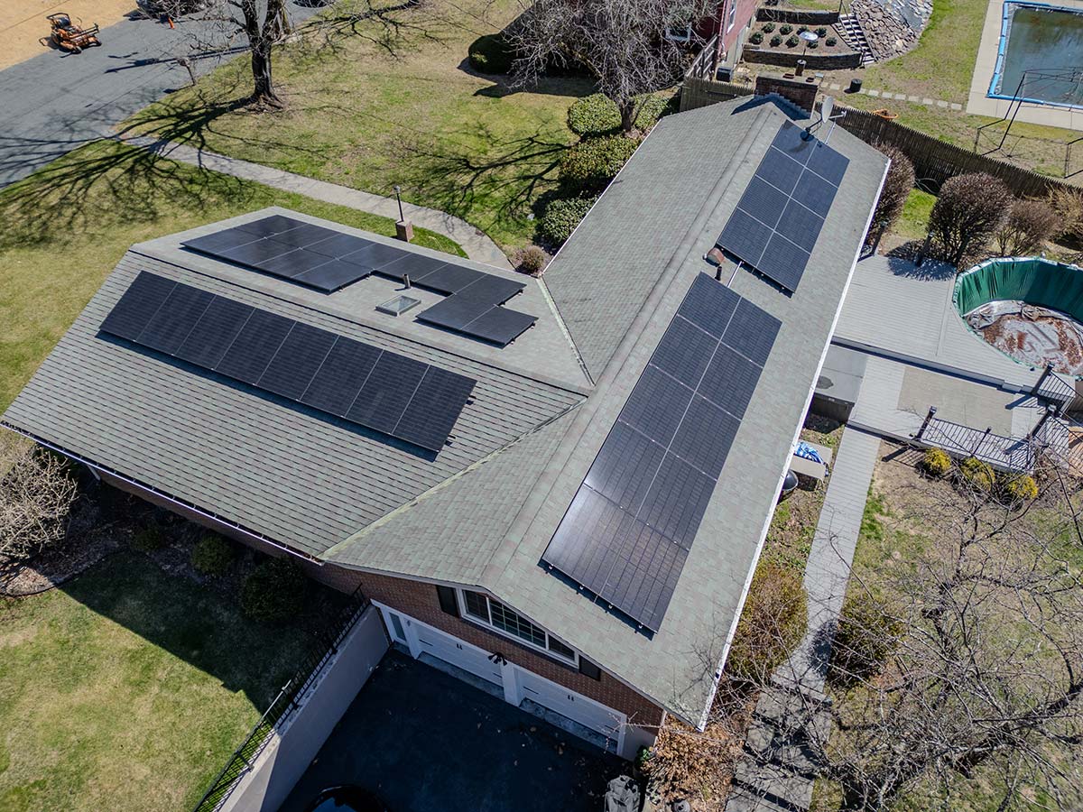 Greenfield Solar Panels installed on a residential roof, aerial view of home solar array in Greenfield MA