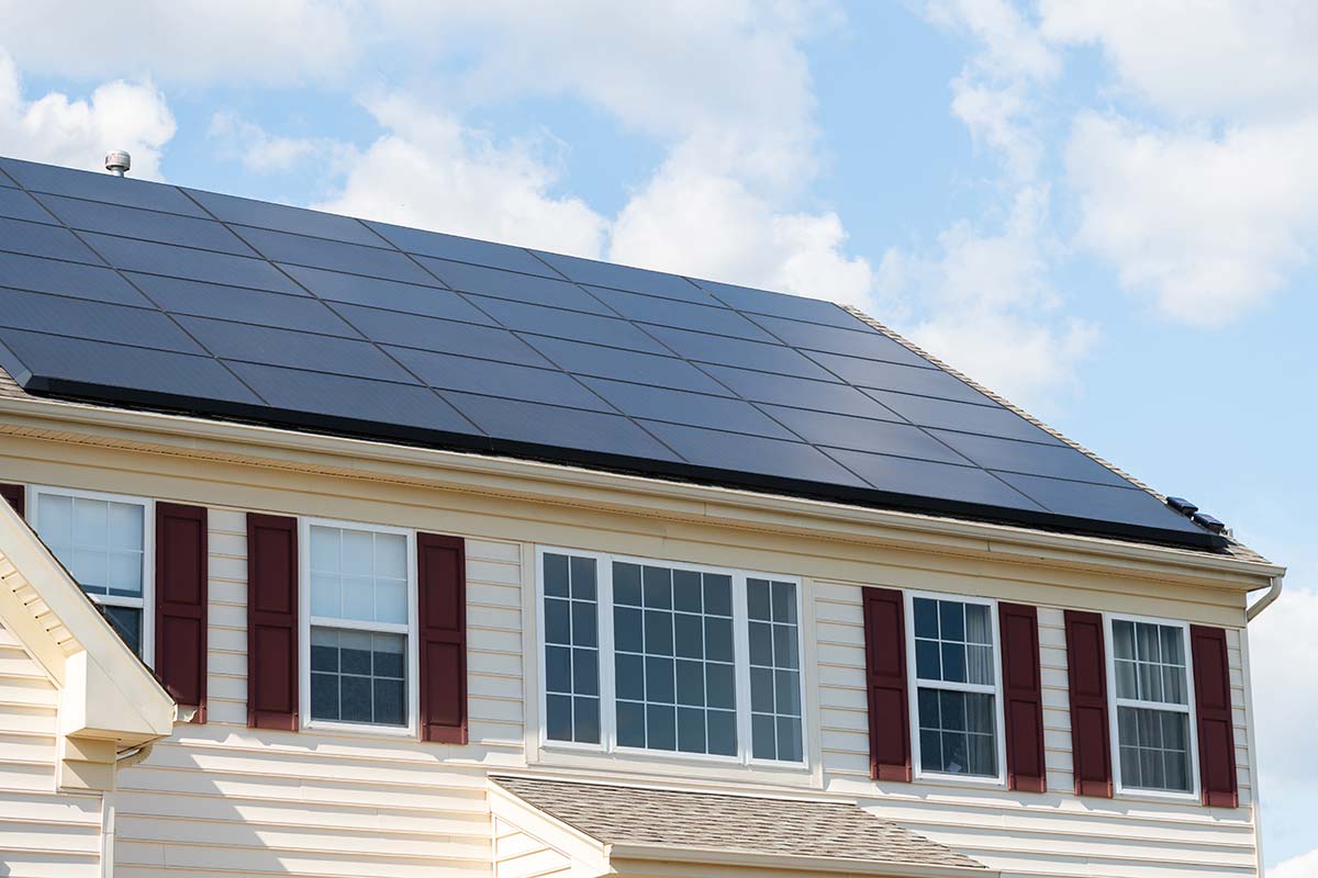 Solar power for residential homes in Western Massachusetts with full roof array on two-story house
