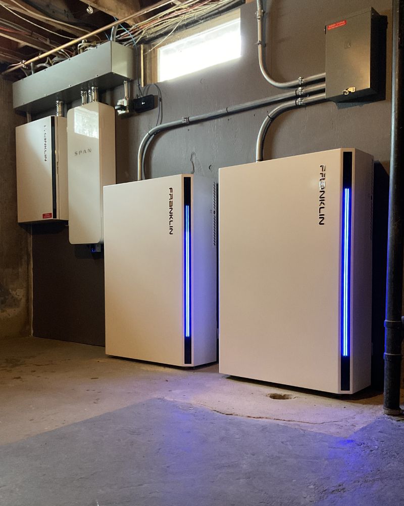 Full basement battery backup system with two Franklin units, a Span smart panel, and conduit wiring